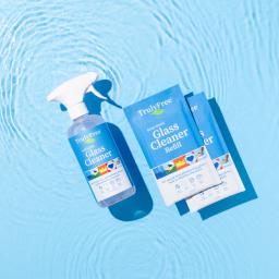 Truly Free Home non-toxic Glass Cleaner spray bottle and 2 refill packs.