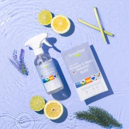 Truly Free Home Wrinkle & Static Releaser spray bottle and 1 refill pack.